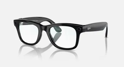 Product shot of black Wayfarer-style glasses on a white and light gray background.