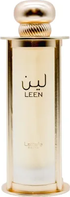 A close-up, front-facing studio shot of a gold perfume bottle with a white frosted glass section.