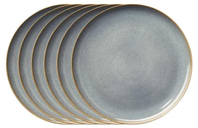 A stack of six gray and blue plates with brown rims, viewed from above.