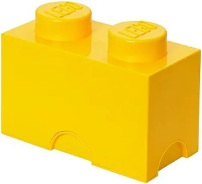 A yellow LEGO storage brick with two studs on top.