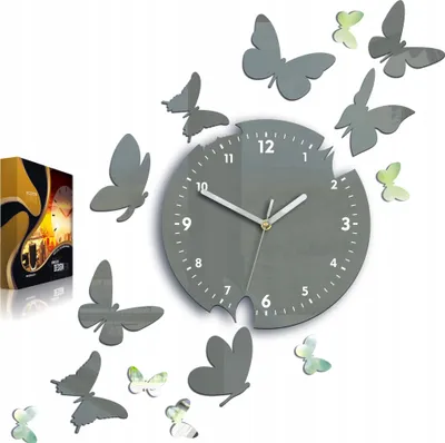 A decorative wall clock with butterfly stickers.