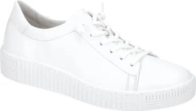 A studio shot of a single white sneaker.