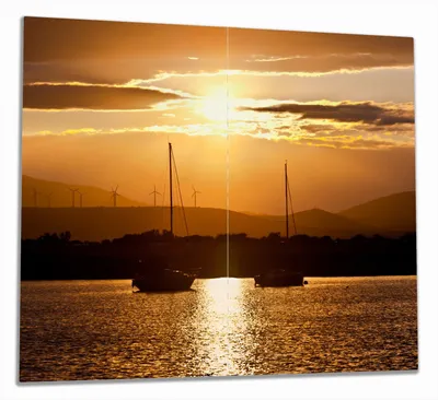 Produktbild von Wallario Herdabdeckplatte aus Glas, Größe 60 x 52 cm 2-teilig, Motiv Schiffe in der Abenddämmerung auf dem Meer