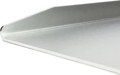 A close-up, angled view of a metallic grill plate.