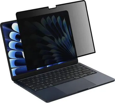 A laptop with a privacy screen filter attached.