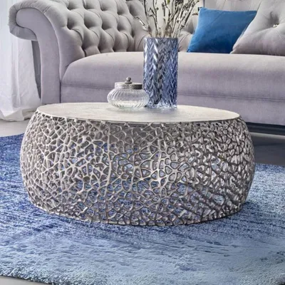 Produktbild von Extravaganter Couchtisch RIXOS ca.73cm silber Metall Handarbeit