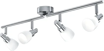A four-light track lighting fixture with adjustable spotlights.