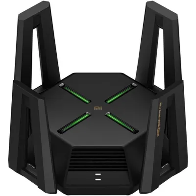 A product shot of a black Xiaomi router with green accents.