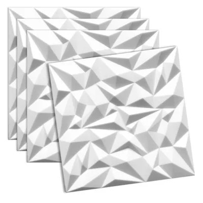 A stack of four white 3D wall panels with a geometric, faceted design.
