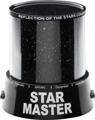 A black star projector lamp with white stars projected onto its surface.