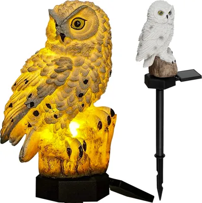 Two solar-powered owl garden lights on a white background.