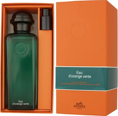 A gift set of Hermès Eau D'Orange Verte Eau de Cologne for unisex, featuring a large bottle and a smaller spray bottle, presented in an orange box.