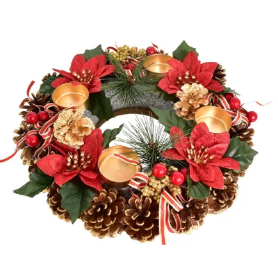 A Christmas wreath with candles, pinecones, red flowers, and berries.