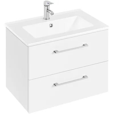 A white bathroom vanity with a sink and faucet.