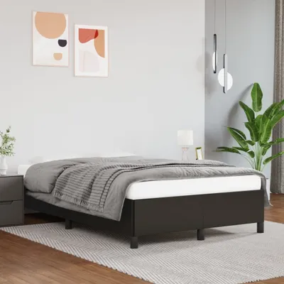 A bedroom scene with a bed and decorative items.