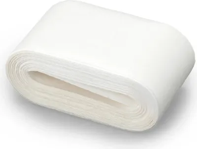 A roll of white interfacing material.