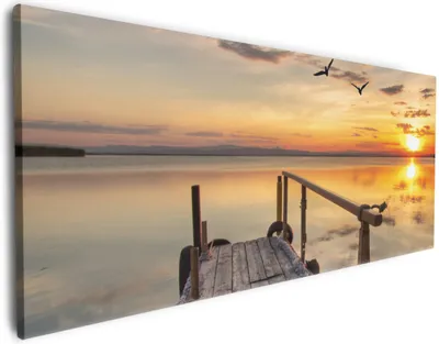 Produktbild von Wallario Premium Leinwandbild Sonnenuntergang über dem See  idyllischer Steg in Größe 60 x 150 cm