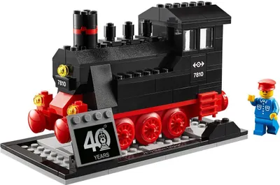 A Lego miniature steam engine set with a Lego figure.