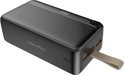 A black power bank with a textured top and a tan strap is shown against a white background.