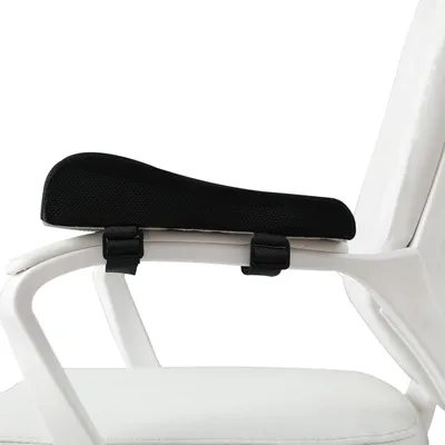A close-up of a black armrest pad attached to the armrest of a white chair.