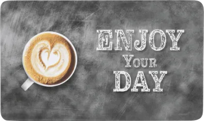 A cup of coffee with latte art and text that says "ENJOY YOUR DAY" on a chalkboard background.