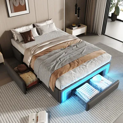 A modern bedroom with a bed featuring storage drawers and LED lighting.