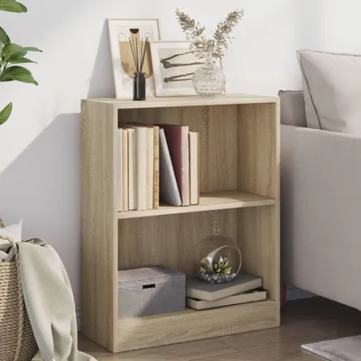 A bookshelf with books and decorative items.