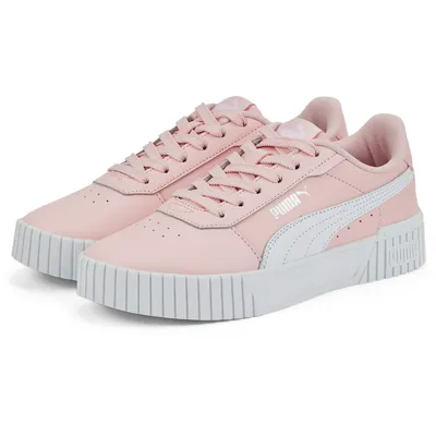A pair of pink Puma Carina 2.0 Jr sneakers on a white background.