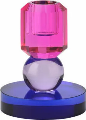 A clear studio shot of a decorative glass candle holder.