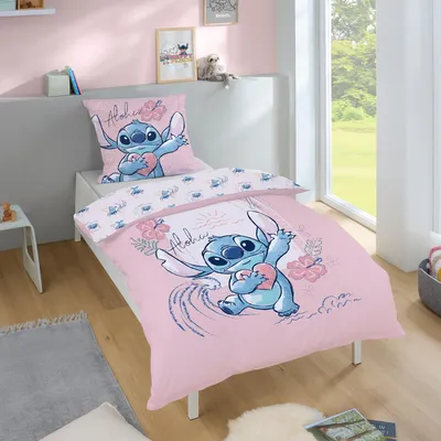 A child's bedroom with a bed featuring Lilo and Stitch themed bedding.