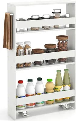 A white four-tier rolling storage cart filled with various jars and bottles.