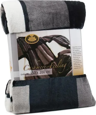A rolled-up blanket is presented on its packaging, which displays a picture of the blanket itself and product information.