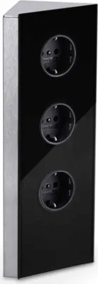 A corner power outlet unit with three sockets.