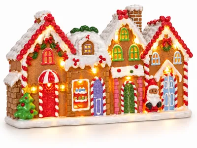 Zdjęcie produktu dla Świąteczne miasteczko piernikowe LED z melodią 31x17 cm Mikołaj choinka