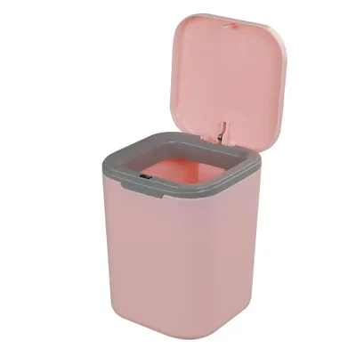 A pink trash can with its lid open, shown against a white background.