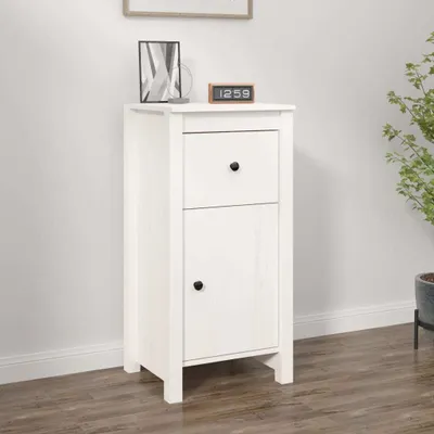 A white wooden cabinet with one drawer and one door, placed against a white wall with a wooden floor.