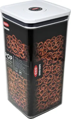 A clear, professional shot of an OXO Good Grips POP container filled with pretzels, set against a white background.