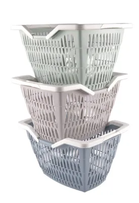 Three stacked plastic shopping baskets in different colors.