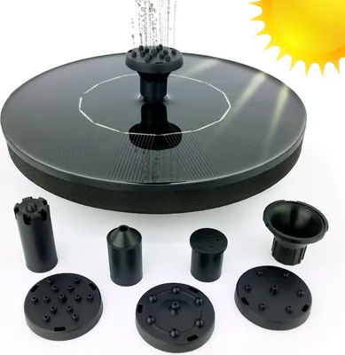 A solar-powered fountain with multiple nozzle attachments, displayed on a white background with a sun graphic in the upper right corner.