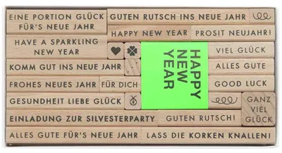 Produktbild von Stempelset mit Silvester-Schriftzügen, Happy New Year Motiven, 23 Stempel und Stempelkissen