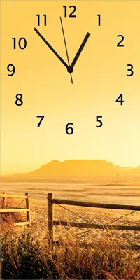 Produktbild von Wallario Design Wanduhr Strand in Südafrika I - Himmel in orange aus Echtglas, Größe 30 x 60 cm
