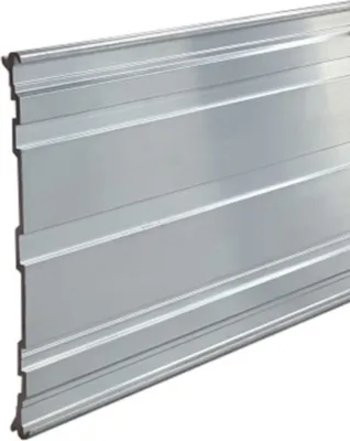 A close-up, angled view of a silver-colored metal edging strip with horizontal ridges.