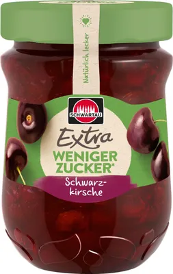 A jar of Schwarztau Extra jam with cherries.