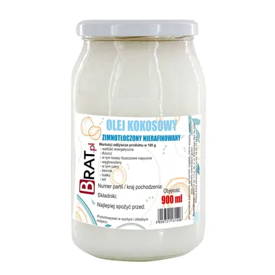 A glass jar of coconut oil with a label.