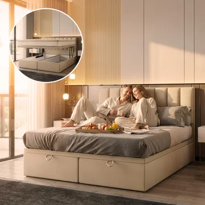 A couple is relaxing in bed in a bedroom, with a tray of food on the bed.
