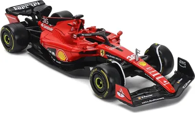 A red and black Ferrari Formula 1 model car.