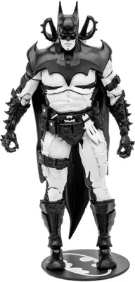 A black and white action figure of Batman standing on a display base.