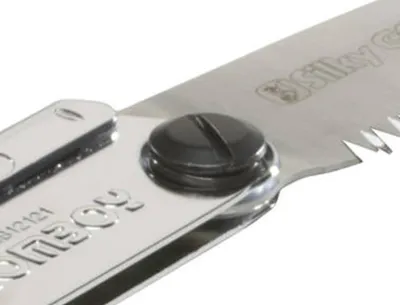 Close-up of a folding saw blade and pivot mechanism.