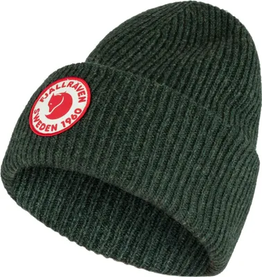 A close-up studio shot of a knitted beanie.