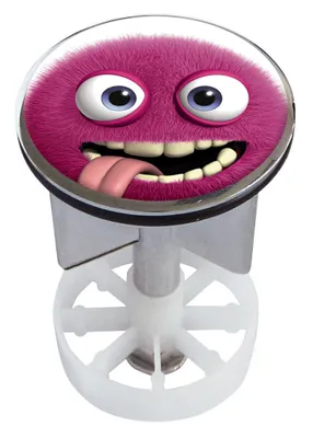 A close-up of a sink plug with a cartoon monster design.